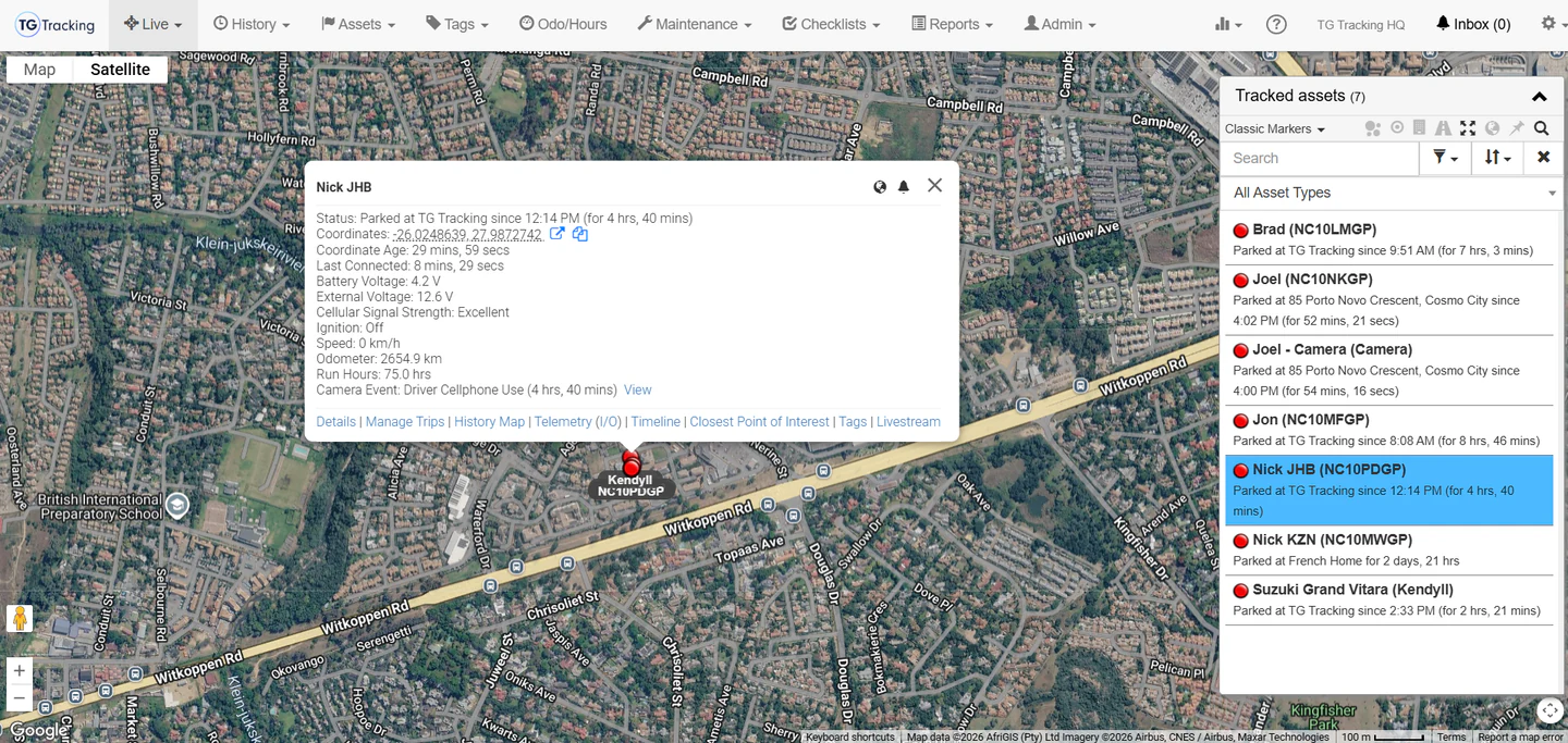 TG Online satellite map with tracked assets and an asset detail panel